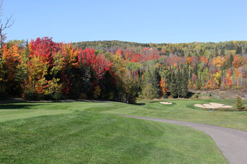 Scenic golf holes in the fall season