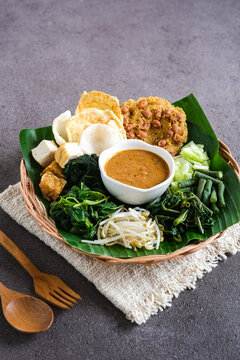 pecal is boiled mixed vegetables with peanut sauce