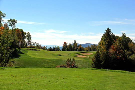 Scenic golf holes in the fall season