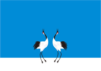 冬の湿原で求愛ダンスをするタンチョウのつがい