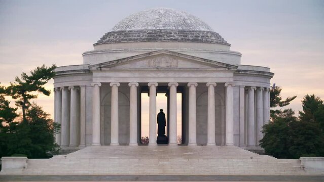 Lockdown Slow Motion Shot Of Thomas Jefferson Statue In Historic Memorial Against Sky During Sunset - Washington, District of Columbia