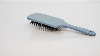 Hairdresser hair brush on white background