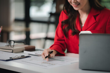Company finance staff preparing financial documents, company finance staff preparing company...
