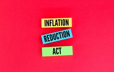 colored paper with the words Inflation Reduction Act.