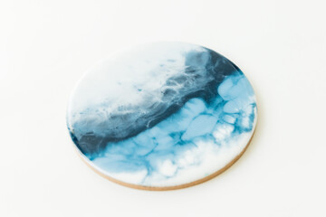 Resin epoxy art with soft blue and white colors. Epoxy effect background