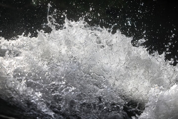 Fototapeta na wymiar water jet spray abstract background flow stream river nature