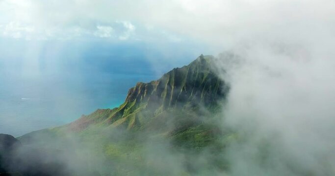 Aerial Forward Shot Of Idyllic Mountain By Sea Amidst Clouds - Waikiki, Hawaii