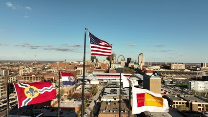 USA and other flags flying high over Saint Louis, Missouri city.