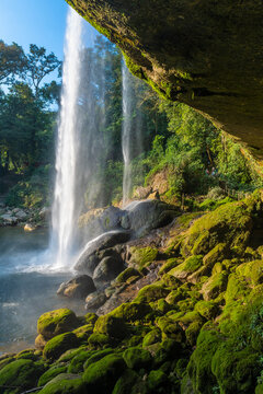 Vertical landscape of Misol Ha waterfall at sunset, Chiapas, Mexico. © SL-Photography