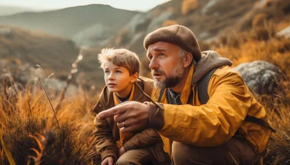 Foto op Canvas Father and son bond over winter hike generated by AI © Jeronimo Ramos