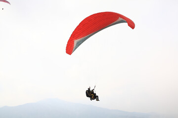 paragliding in the sky