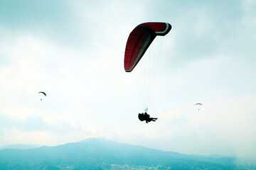 paragliding in the sky