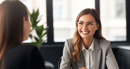 A happy female executive smiles at the camera while interviewing job applicants. AI-generated images

