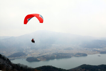 paraglider over the mountains