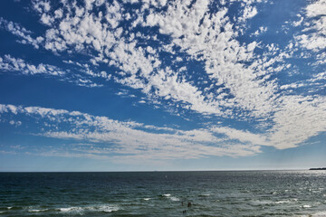 Obraz premium Gunnamatta Beach in Fingal is an exposed, high energy, 3km stretch of beach with a wide, rip dominated surf zone. It is located in the Mornington Peninsula National Park 