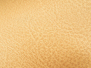 Macro shots, leather or artificial leather surfaces. Brown or golden leather craft pattern.