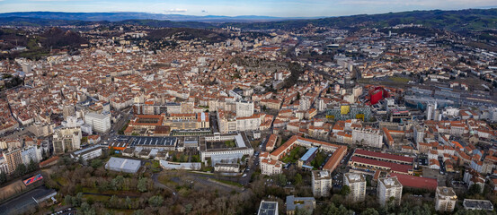 Aerial around the city Saint-Etienne in France on a sunny morning in spring.
