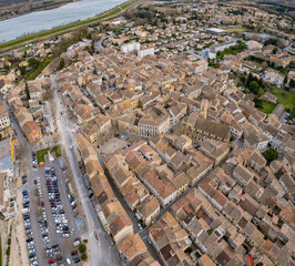 Aerial of the old town of Roquemaure on a sunny day in spring in France.