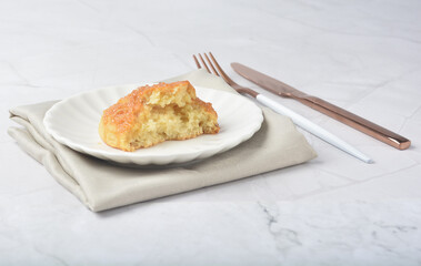 gourmet freshly bake golden Texas sweet original honey biscuit bun cake scone milk butter bread in square bento wood box on white marble table rose gold fork knife pastry halal dessert vegan menu