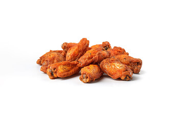a pile of spicy fried chicken wings isolated on a white background. Created with Generative AI Technology