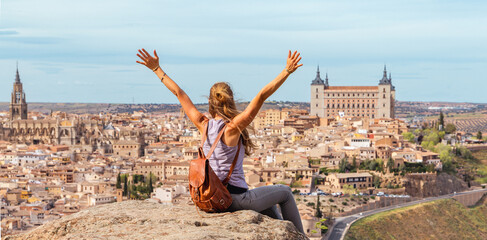 Woman tourist in Toledo city landscape panoramic view in Spain - obrazy, fototapety, plakaty