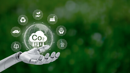Reduce CO2 emission concept in the robotic hand with icons, global warming for environmental.Net...