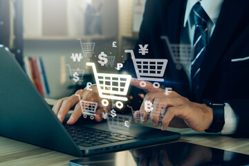 Online shopping concept.Businessman using laptop for online shopping, e-commerce, internet banking,...