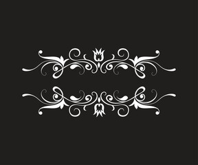 White floral border on a black background 