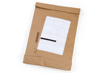 Small mail package with blank paper sticker on white background