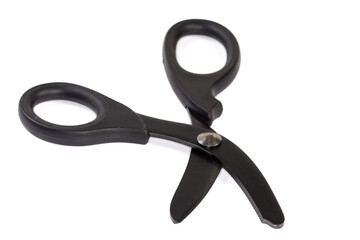 Trauma shears on white background, blades side view close-up