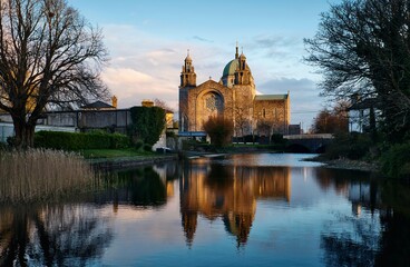 Beautiful scene of irish landmark Galway cathedral reflected in Corrib river at Galway City, Ireland 