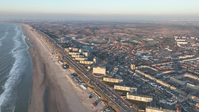 A captivating aerial view of the Zandvoort coast at sunset, highlighting the stunning beauty of the Dutch seaside town.