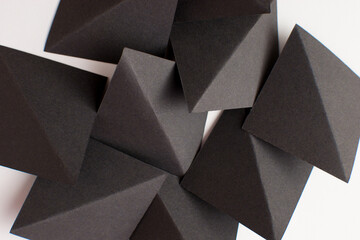 Black triangle shapes on white background