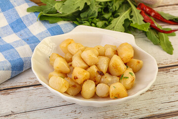 Roasted delicous scallop in the bowl