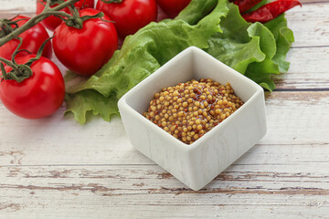 Fototapeta na wymiar Mustard seeds sauce in the bowl