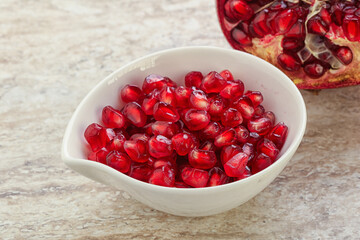 Ripe red Pomegranate seeds in the bowl