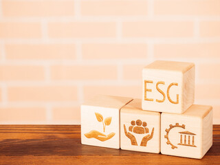 Environmental, Governance and Social symbols on wooden board as concept of ESG principles