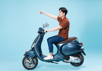 Obraz na płótnie Canvas Image of yougn Asian man on motorbike