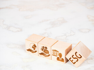 ESG criteria symbols on wooden cubes as a concept of company governance principles