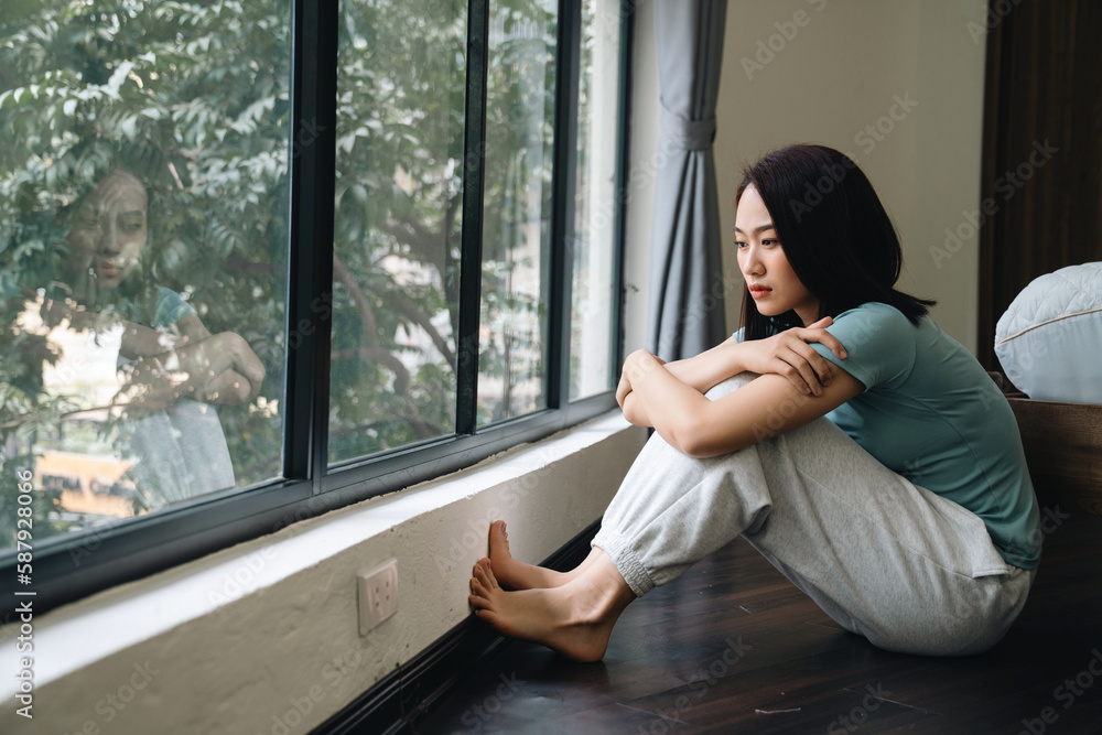 Wall mural young asian woman at home