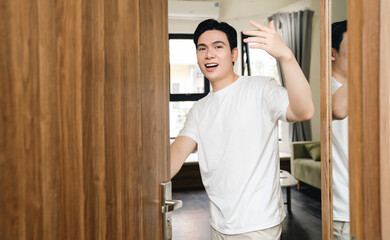 Fototapeta premium Image of young Asian man at home
