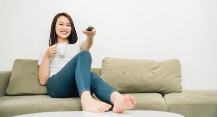 Image of young Asian woman at home