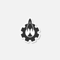 Rocket and gear glyph sticker icon