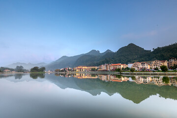 Fototapeta premium the beautiful reflection images in the center lake of Sa Pa town in the early morning. Sa Pa town is known as the best place for traveling