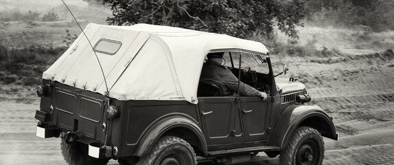 OLD MILITARY CAR - Russian all-terrain vehicle on a dirt road

