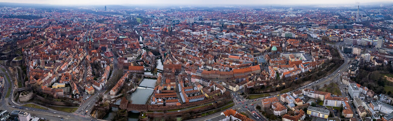Fototapeta na wymiar Aerial of the old town of Beaune in France on a cloudy morning in early spring.