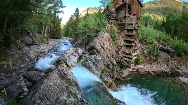 Timelapse Of A River Flowing Past Rocky Terrain And Famous Crystal Mill - Carbondale, Colorado