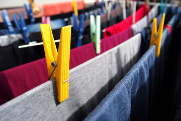 Clothes are drying with clothespins