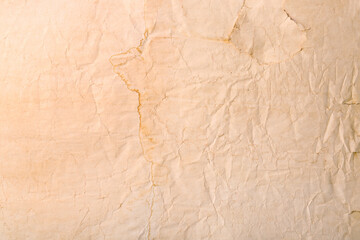 Sheet of old parchment paper as background, top view