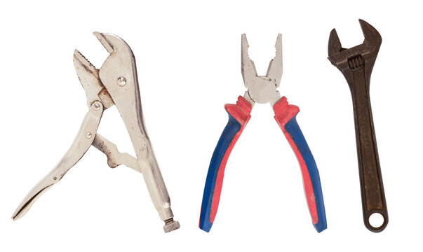 Old pliers and wrench on transparent background.